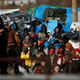 Migrants and activists at the Calais camp (AP Photo/Jerome Delay)
